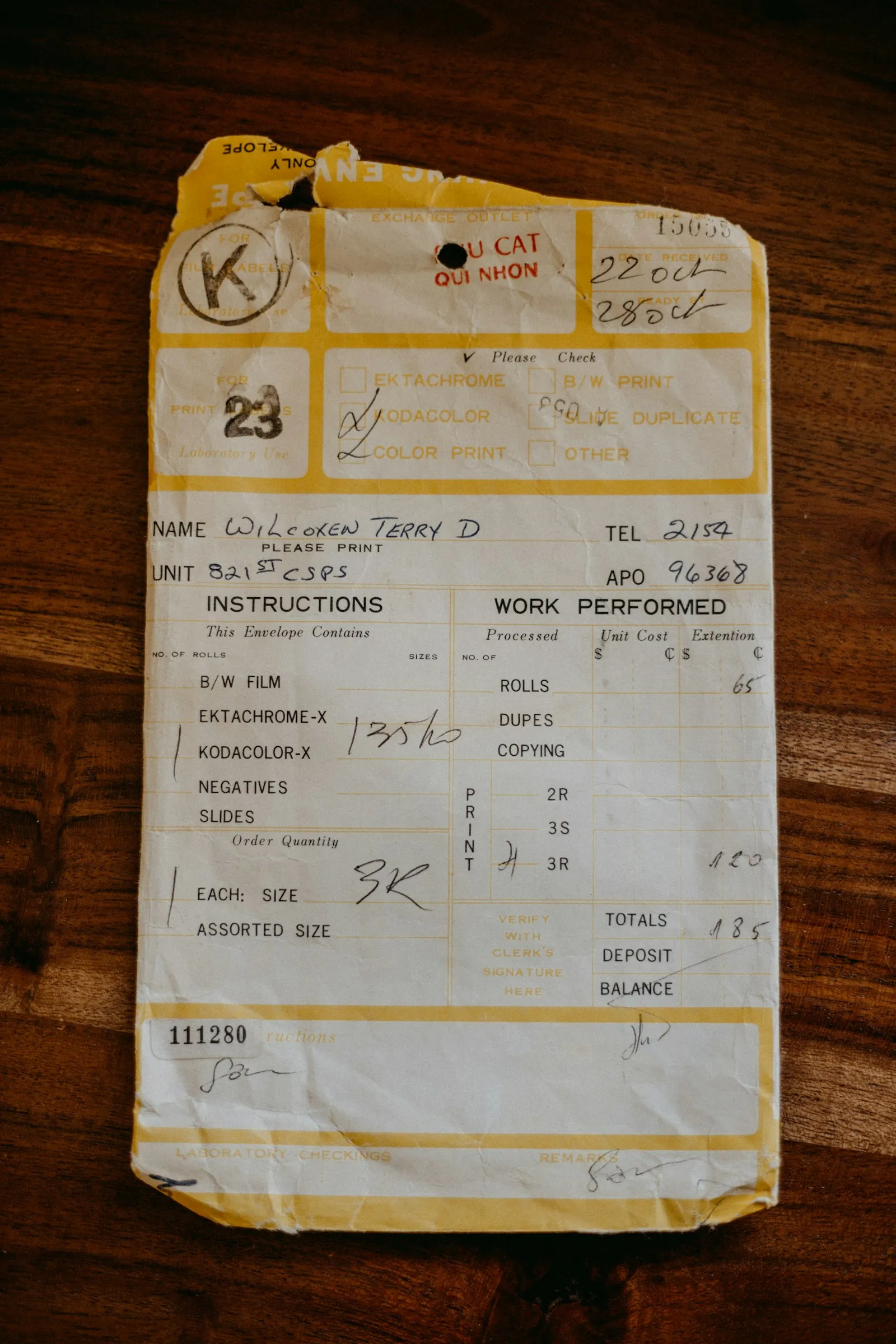A paper receipt on a wooden table
