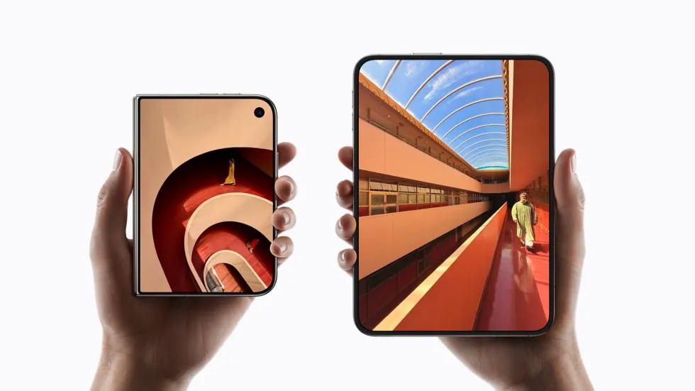Two hands hold up iPhone Duo devices, one folded and one unfolded